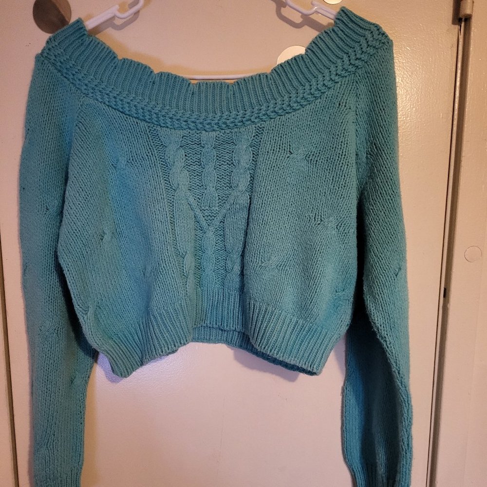 NEXT ISSUE SWEATER